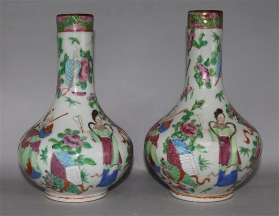 A pair of Chinese Famille Rose bottle vases, 19th Century